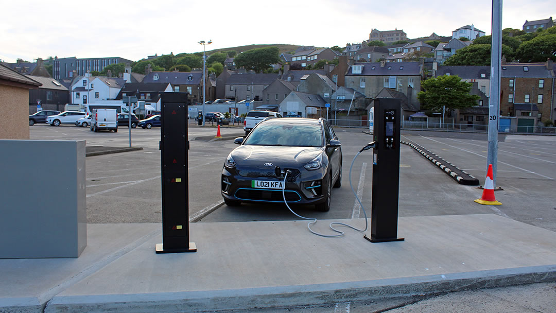 Charging an electric vehicle at the Stromness Ferry Terminal