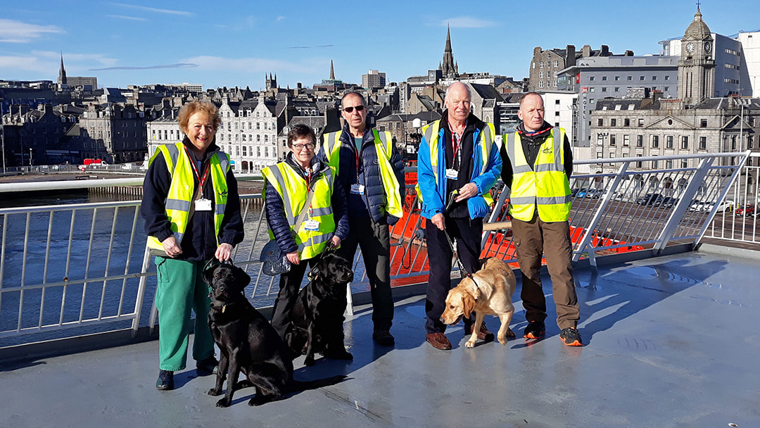 Celebrating International Guide Dog Day on board one of NorthLink Ferries' ships in Aberdeen