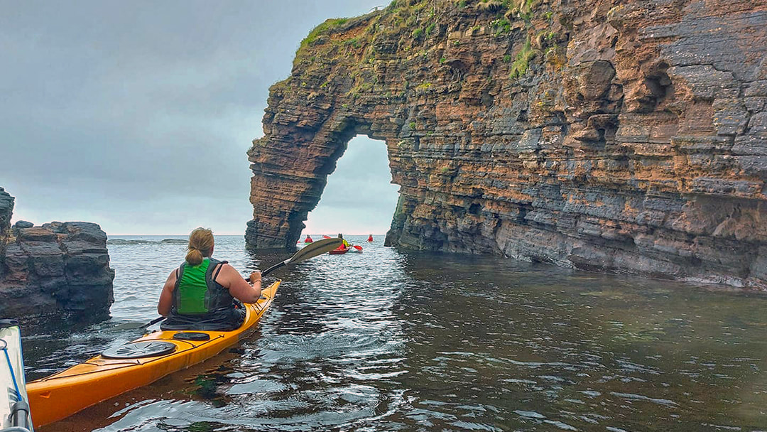 Kayaking around the Orkney coastline photo
