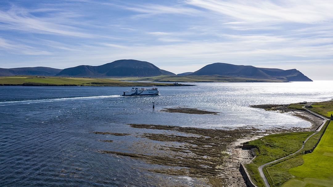 The ferry to Orkney sailing to Caithness with the hills of Hoy in the background