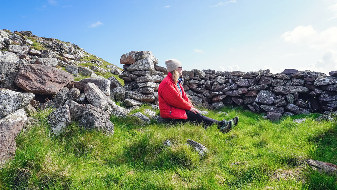Seeking shelter from the strong winds in a ruin near the Eshaness Broch