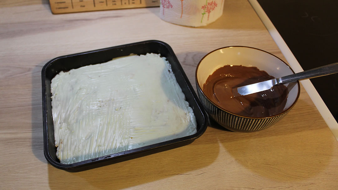 Spread the mint layer on and then the melted chocolate
