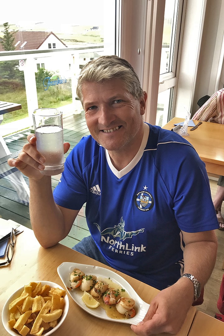 Robin McKelvie enjoying a delicious meal in Shetland
