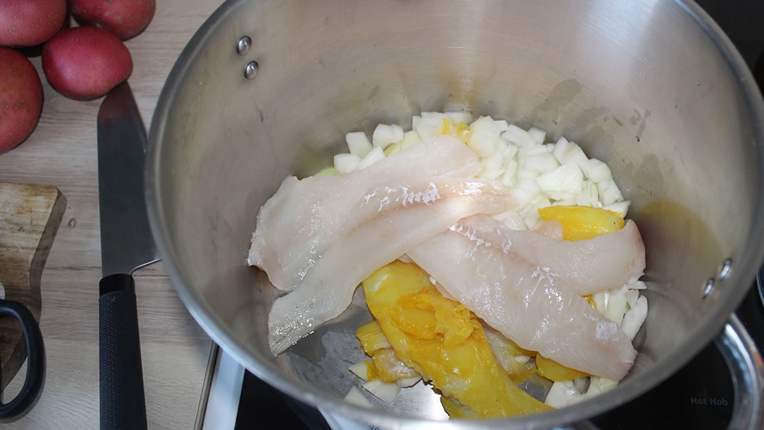 Fish and Onions in a pan