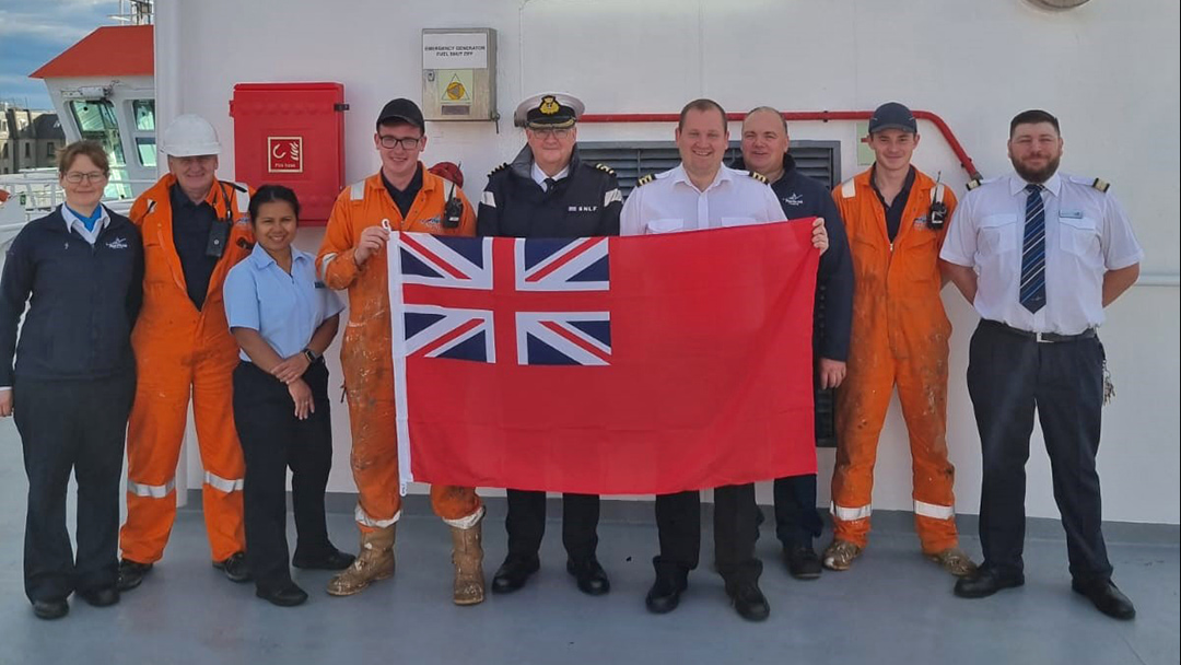 Some of NorthLink Ferries' staff celebrating Merchant Navy Day