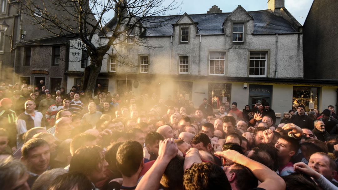 The New Year Ba' in 2017 makes its way to the Big Tree on Albert Street