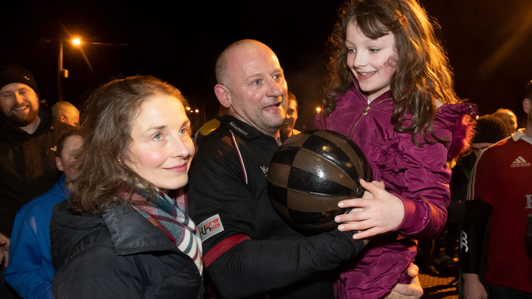 Kevin Sinclair, the 2018 New Year Ba' winner, celebrating with his family