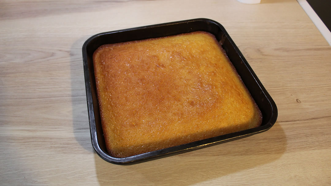 Lemon Drizzle Traybake after the lemon drizzle has been applied