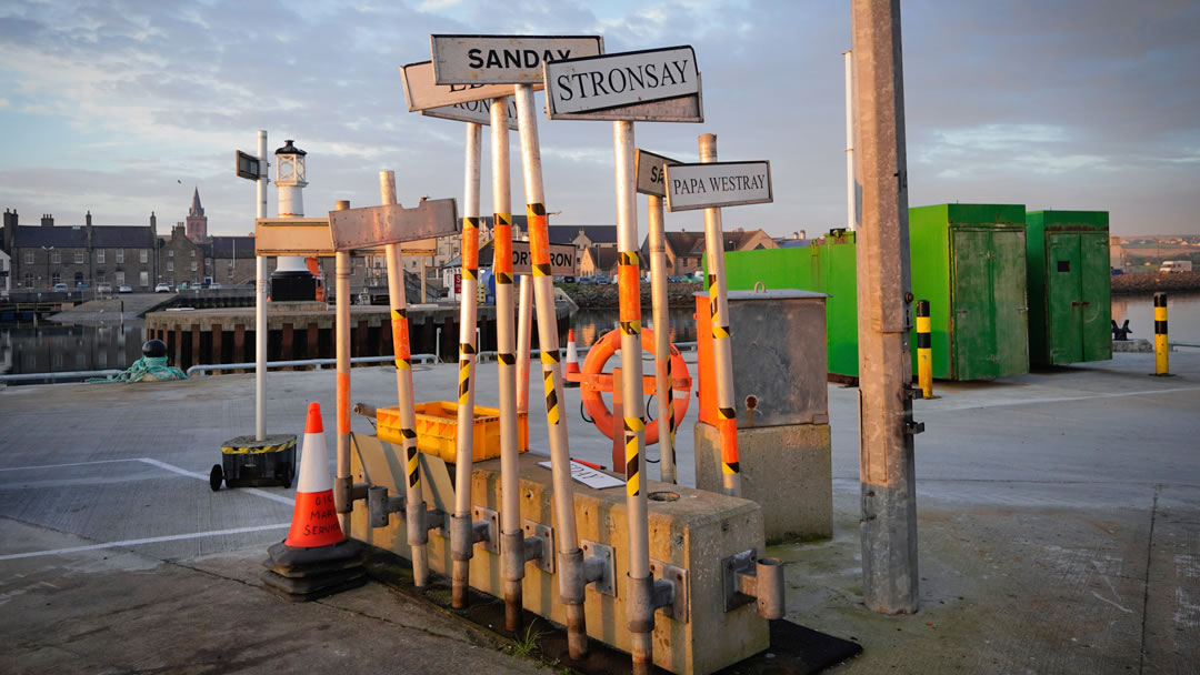 Signs at the Kirkwall pier for the inter-island ferries