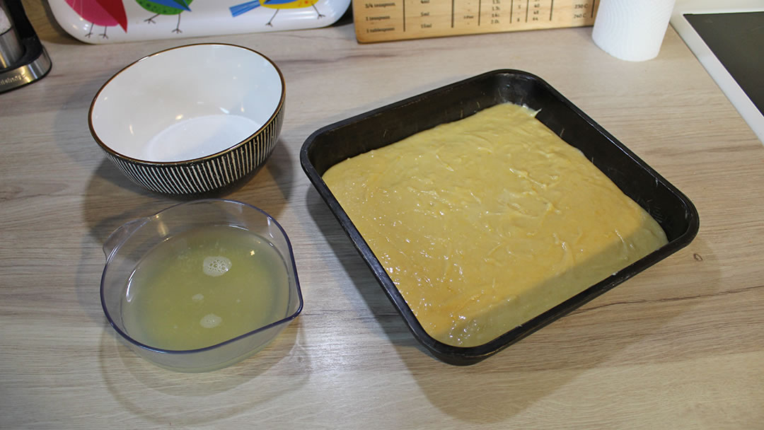 The cake mixture in a baking tray