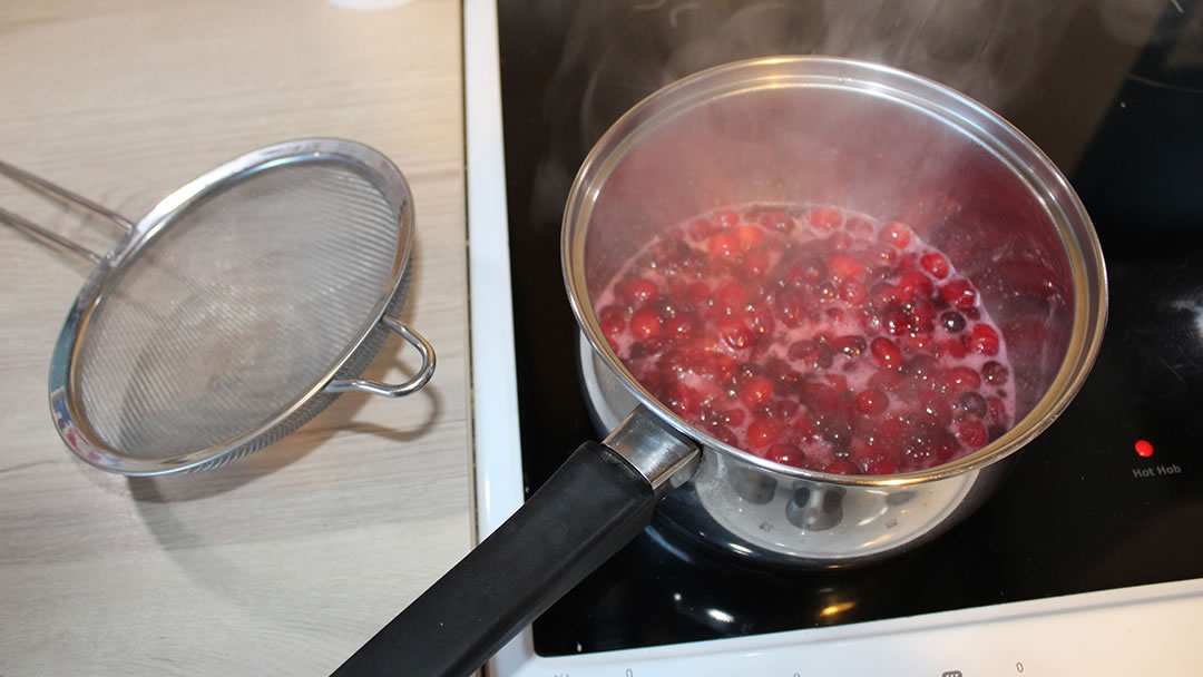 Making the cranberry sauce
