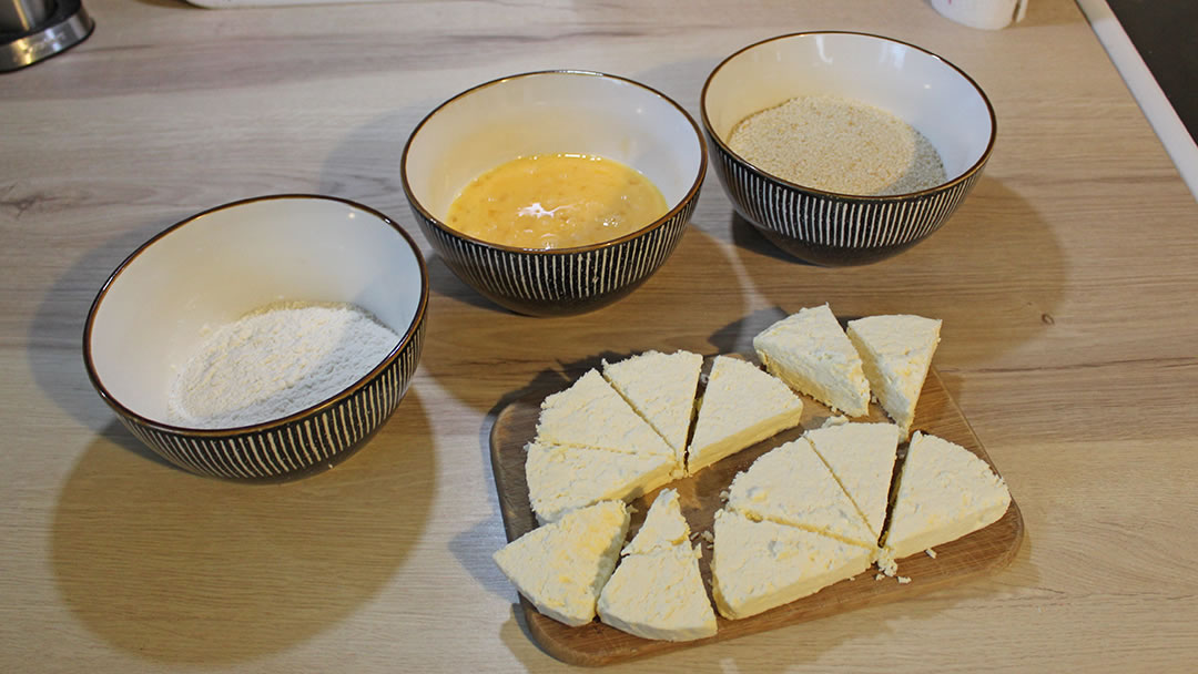 The Grimbister cheese cut into wedges and ready to coat with flour, egg and breadcrumbs