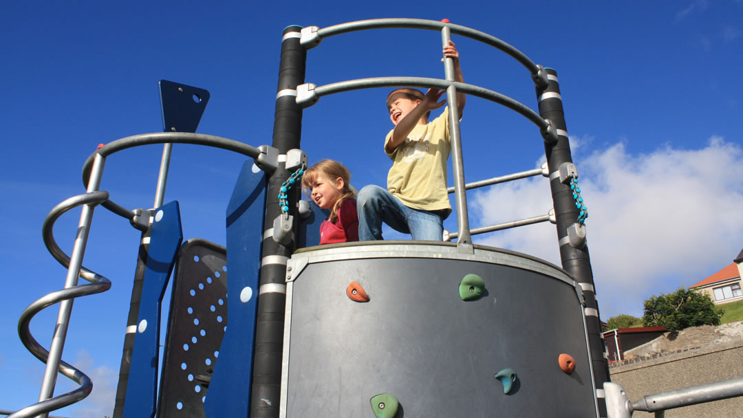Children having fun in playpark, Scalloway