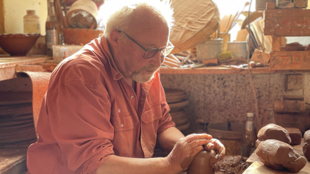 Potter Andrew Appleby working in his Harray studio