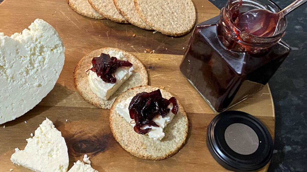 Red onion chutney with cheese and biscuits