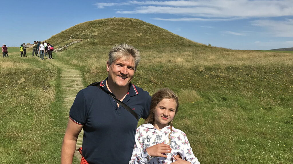 Robin on a visit to Maeshowe with his daughter Tara