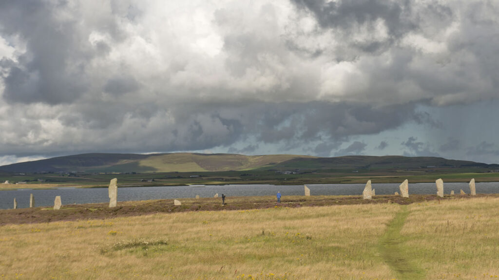 The Ring of Brodgar and the Loch of Harray in Orkney