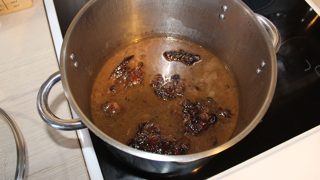 The oxtails and gravy after being cooked low and slow for 8 hours