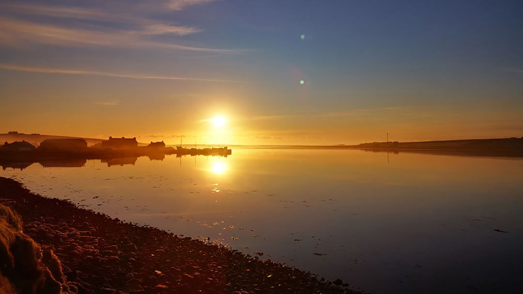 Sunset over Burray from the Orkney Gin Distillery