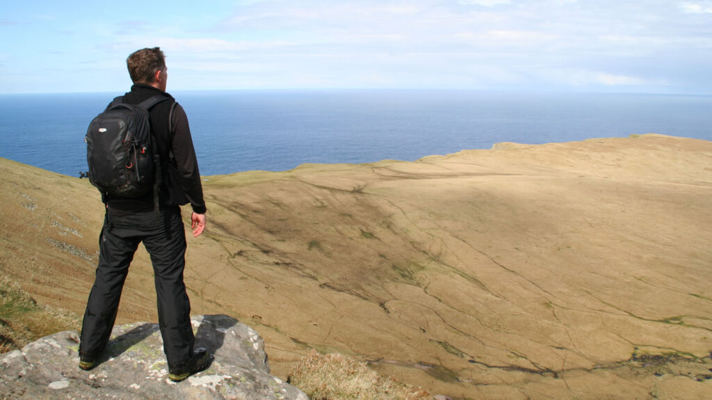 Robin taking in the view in Foula, Shetland