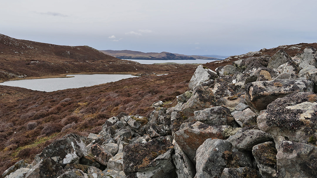 The surrounding landscape at Pundswater chambered cairn