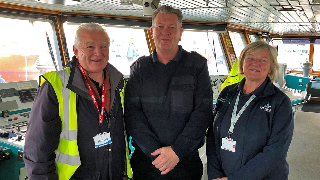 David Wilson (Ship Liaison Officer), Fiona Anderson (Northlink Ferries Terminal Manager), and Avo Orav (Captain) on board the MV Hildasay
