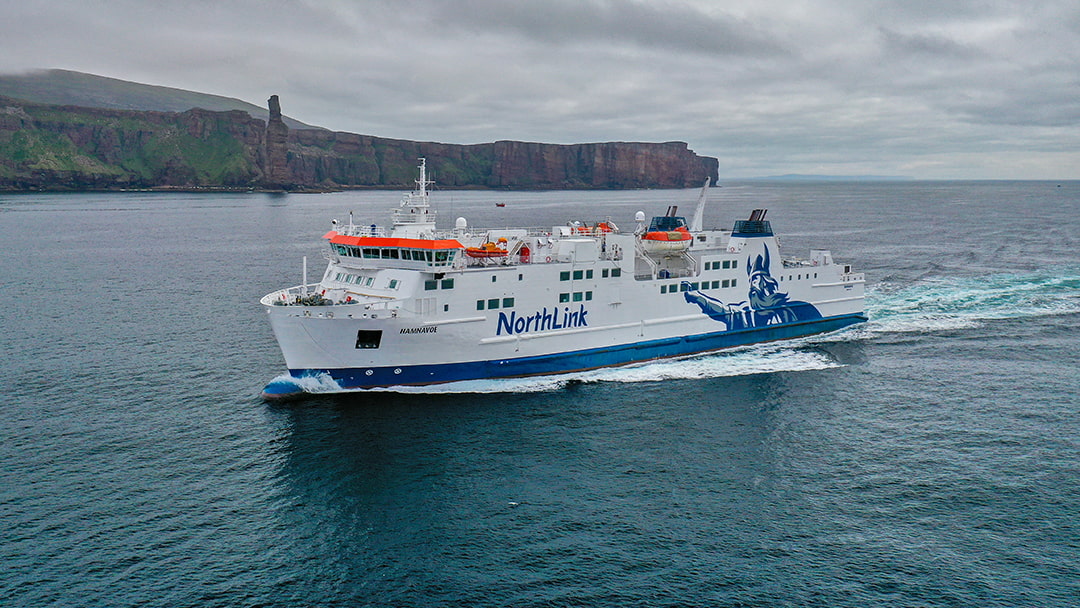 The MV Hamnavoe sailing past the Old Man of Hoy