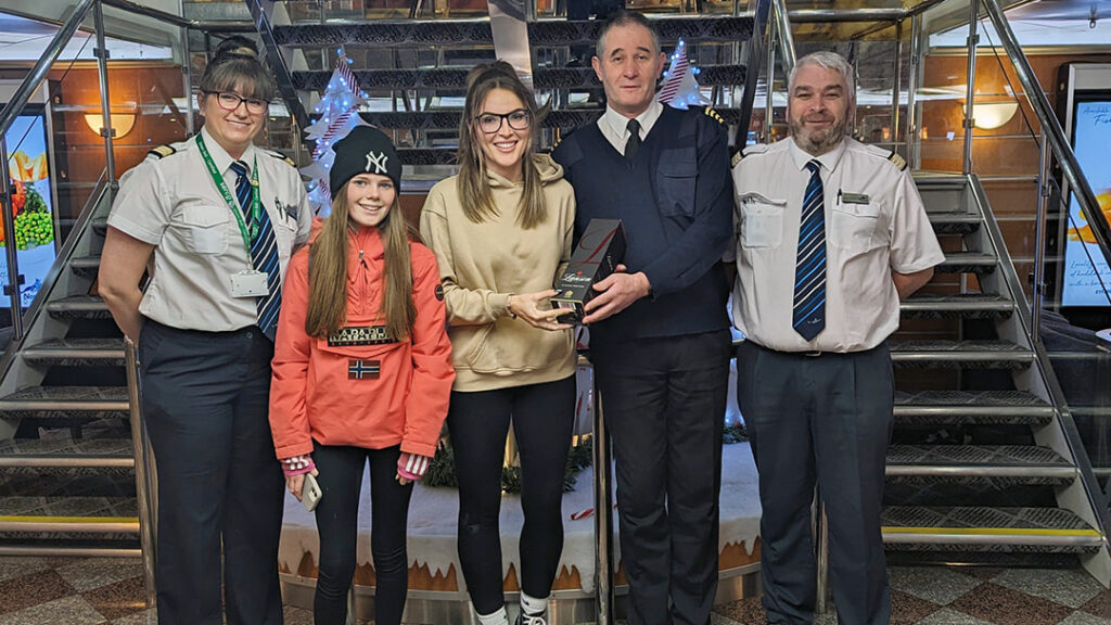 NorthLink Ferries staff with the 400,000th passenger across all ships