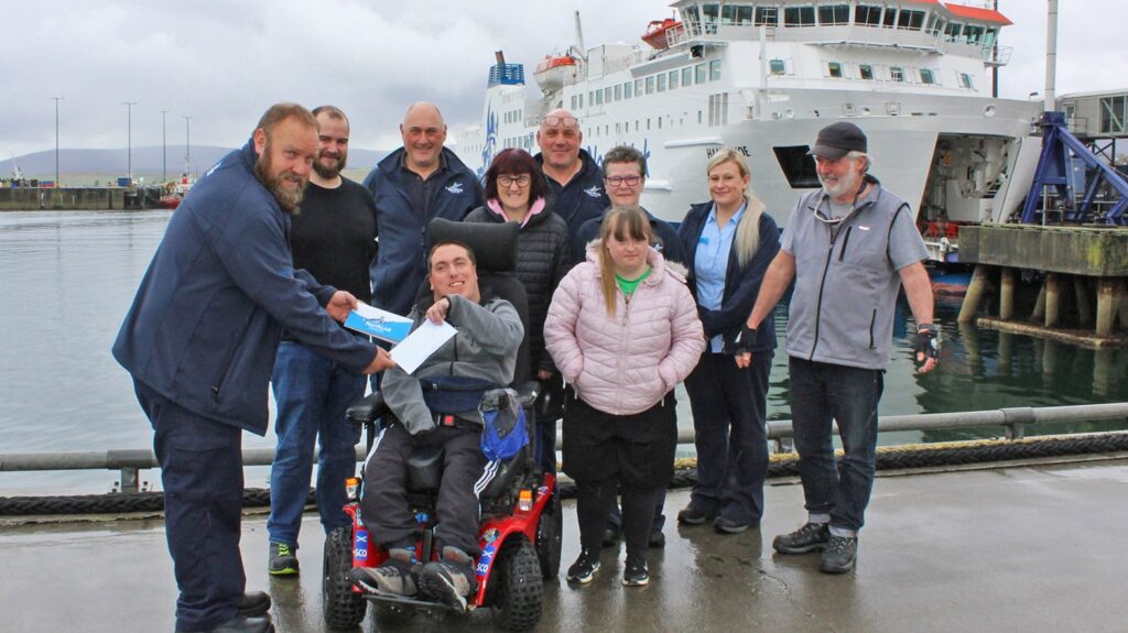 NorthLink Ferries' welcoming members of St Combs to the terminal and gifting a £500 donation