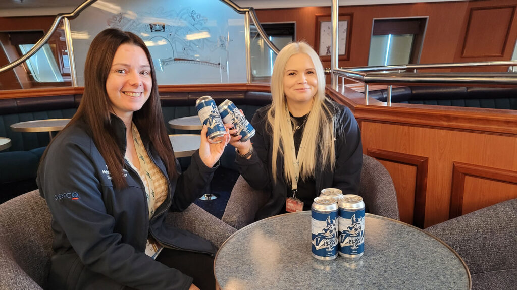 Hotel Operations Co-ordinators Tanya Sim and Vikki Grant with Magnus IPA