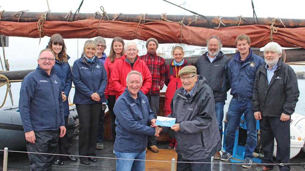 Donation for Shetland charity The Swan Trust