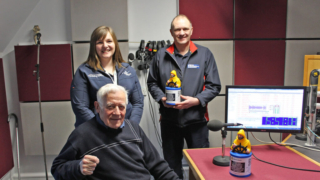 Cheryl Kelday from NorthLink Ferries, David Sinclair from the Orkney Fishermans Mission and retired fisherman Frank Sinclair record the Hamnavoe Safety Announcement