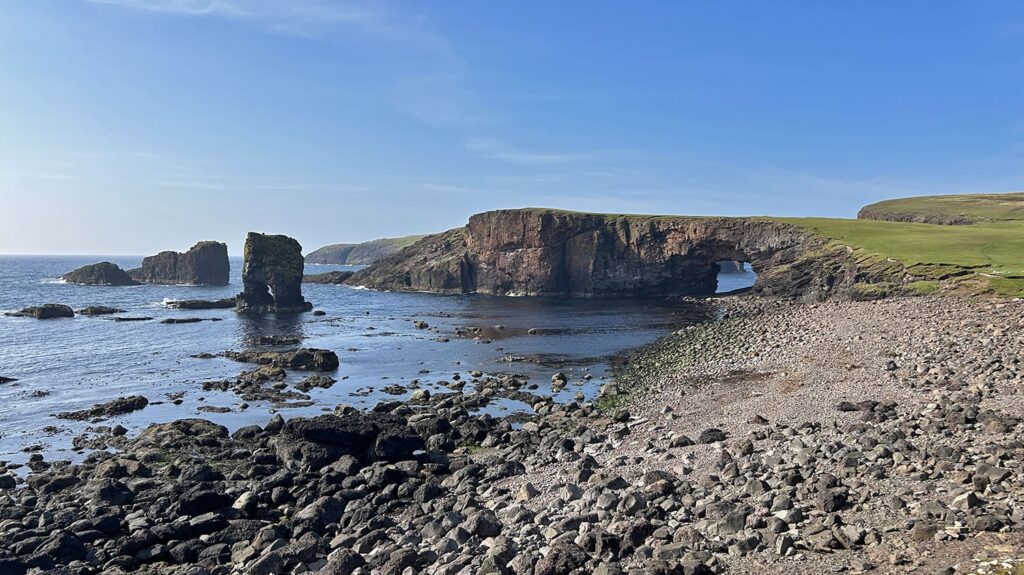 Aesha Head sea stack and arch in Papa Stour, Shetland