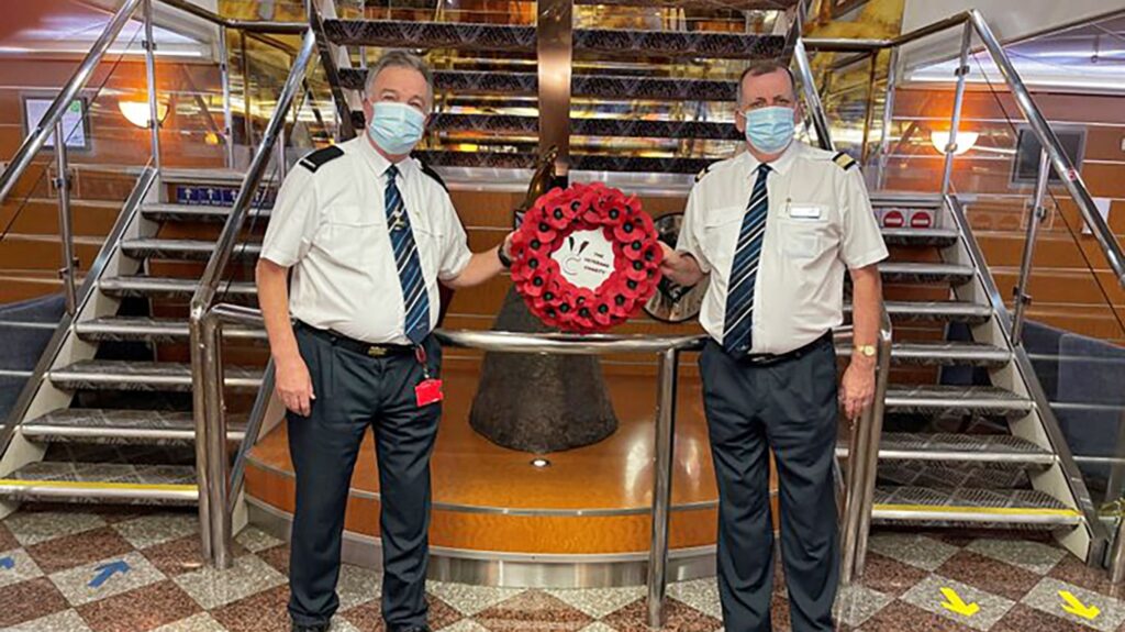 Steve Corlett and John Daly transporting the Remembrance Wreath