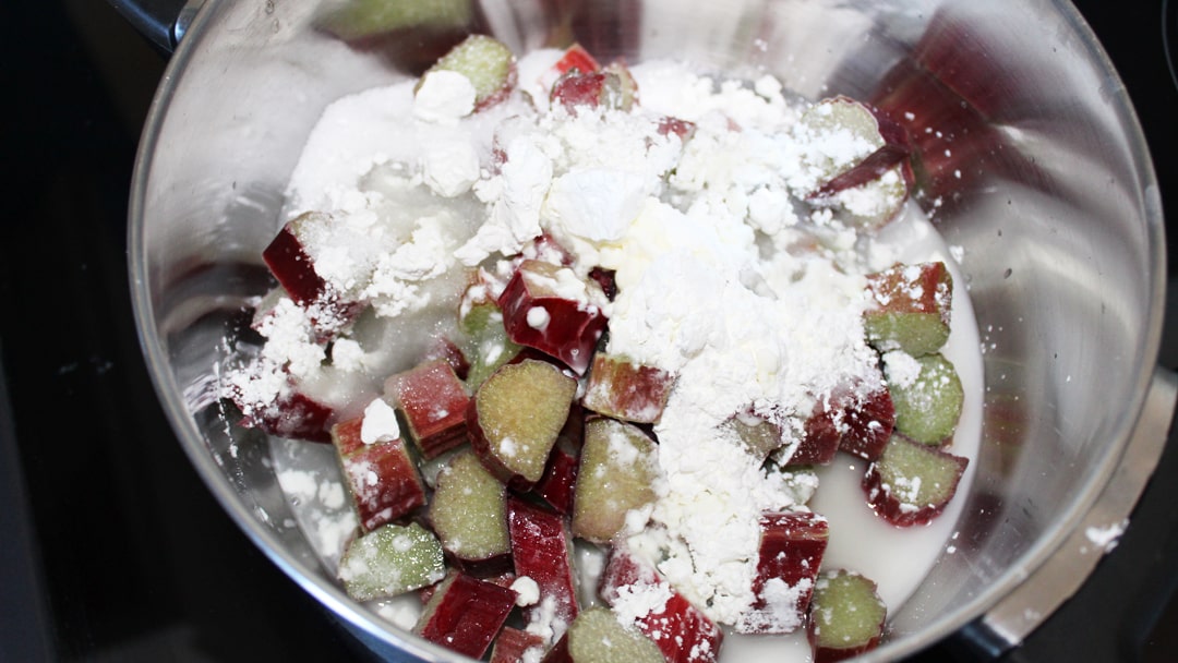 Rhubarb crumble bars ingredients in pan