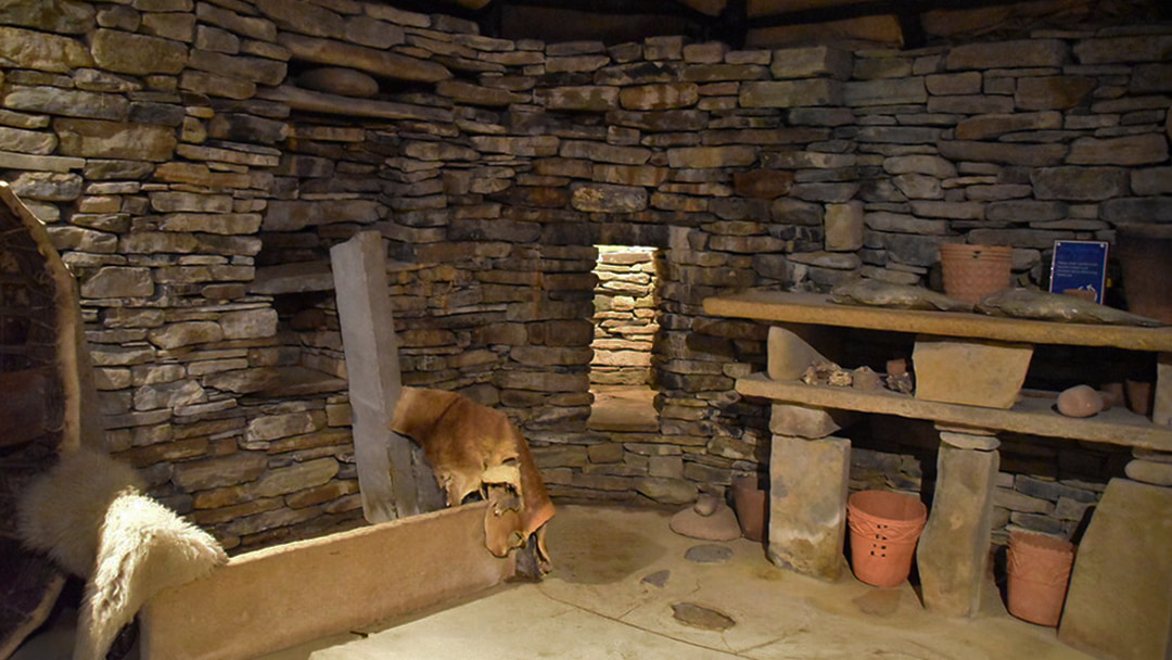 Inside the reconstructed house at Skara Brae