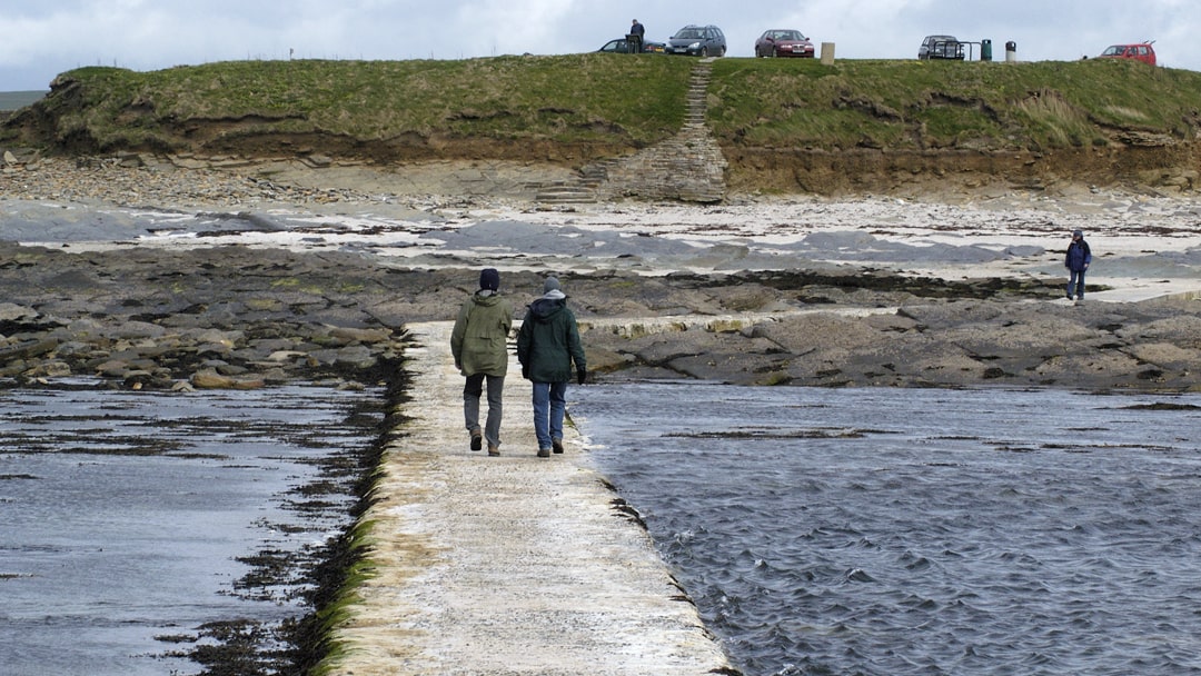 Walking over the causeway at Brough of Birsay