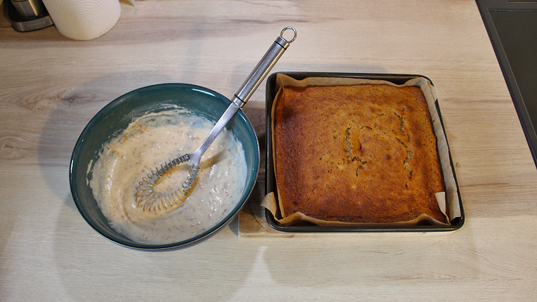 Make the icing and spread it evenly over the top of the cake