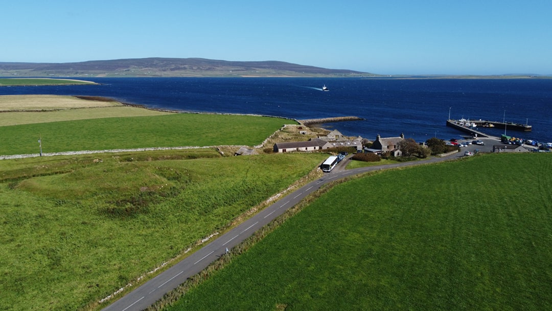The meeting site at Tingwall - a former Iron Age broch which can be seen in the field on the left