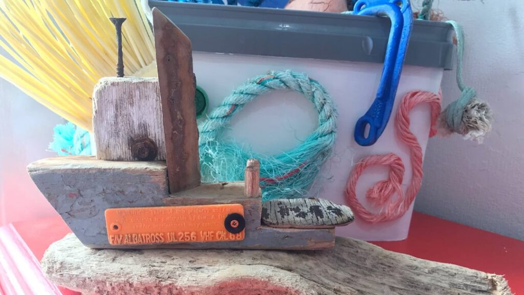 A piece of art created with beach litter and drift wood