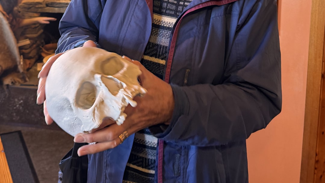 Freda with the skull at the Tomb of the Eagles