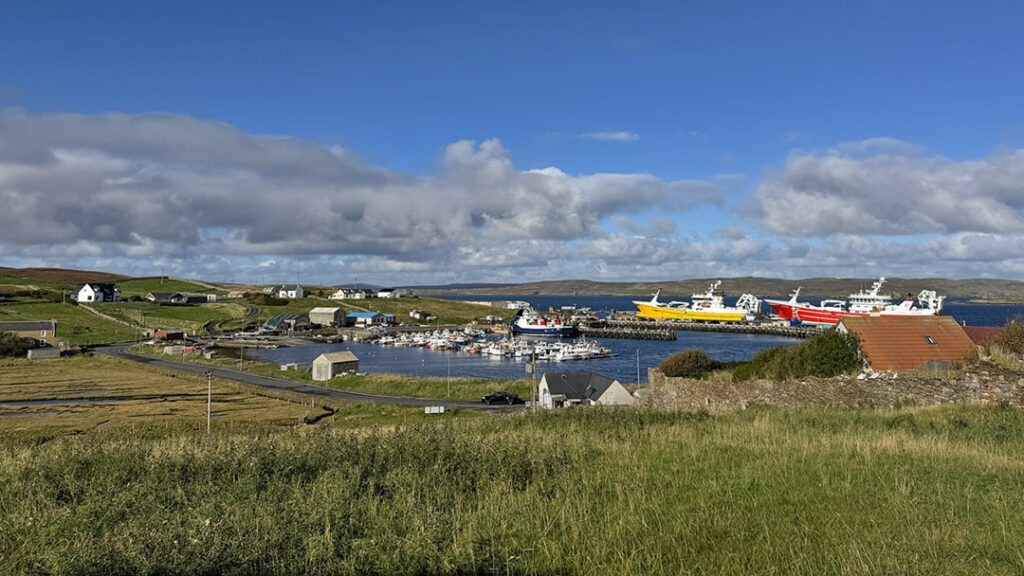 The harbour on Whalsay is home to small vessels and large pelagic trawlers