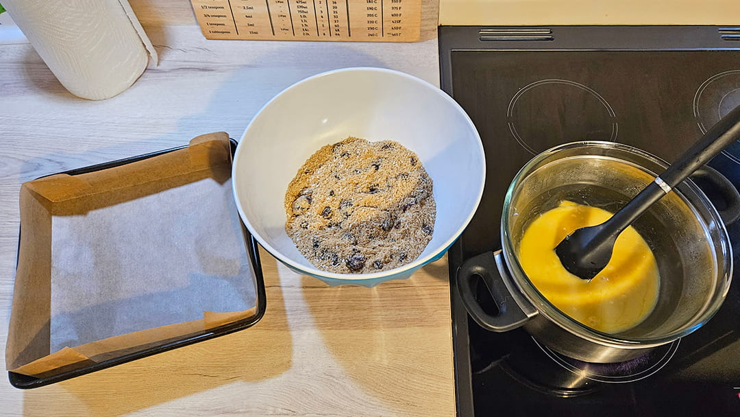 Once melted and combined, add the margarine, syrup and white chocolate mixture with the dry ingredients