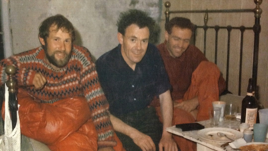 The 1966 climbing team (left to right: Chris Bonington, Dr Tom Patey and Rusty Baillie) in a croft on Hoy