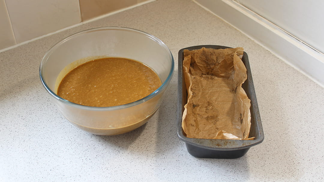 Combine the wet and dry ingredients and pour into lined loaf tin