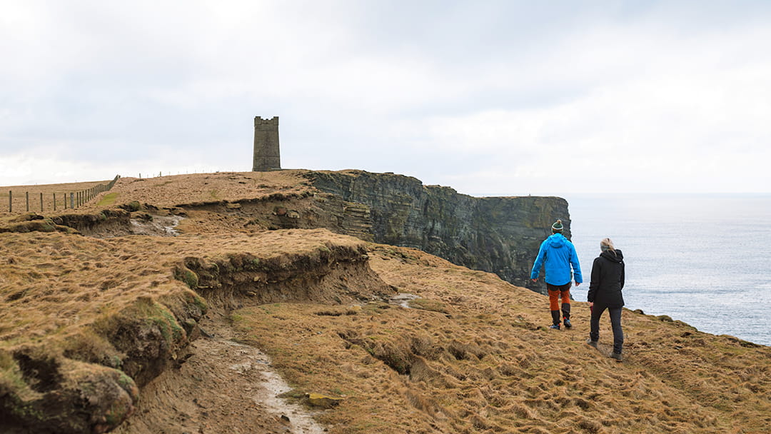 Walking towards the Kitchener Memorial at Marwick Head