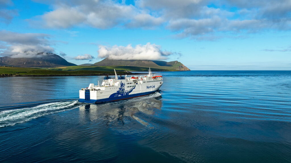 MV Hamnavoe departing Stromness, sailing past the hills of Hoy