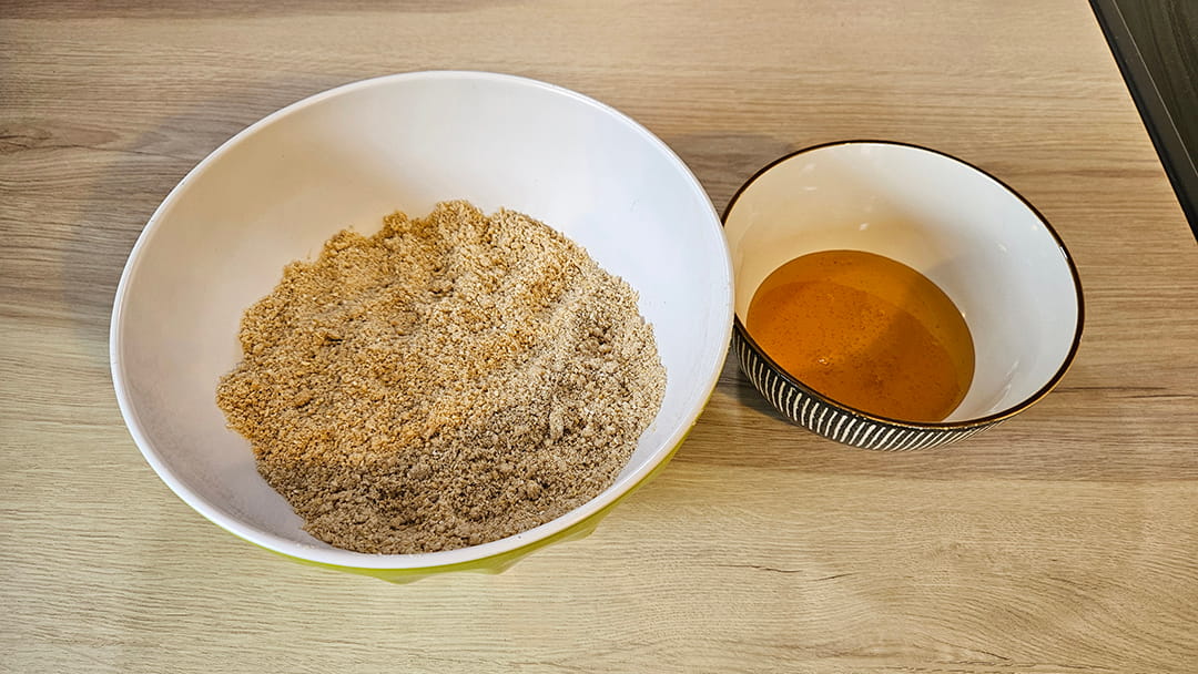 Add the syrup into the dry mixture to form a pliable dough