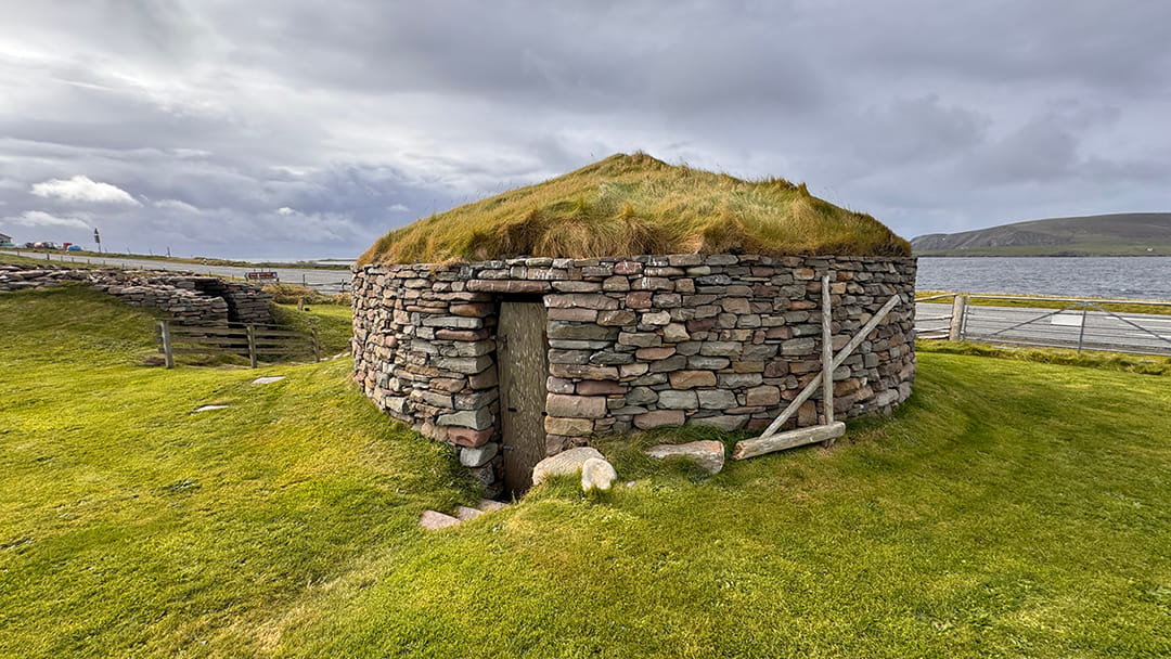 Reconstructed roofed roundhouses give an idea to how people would have lived