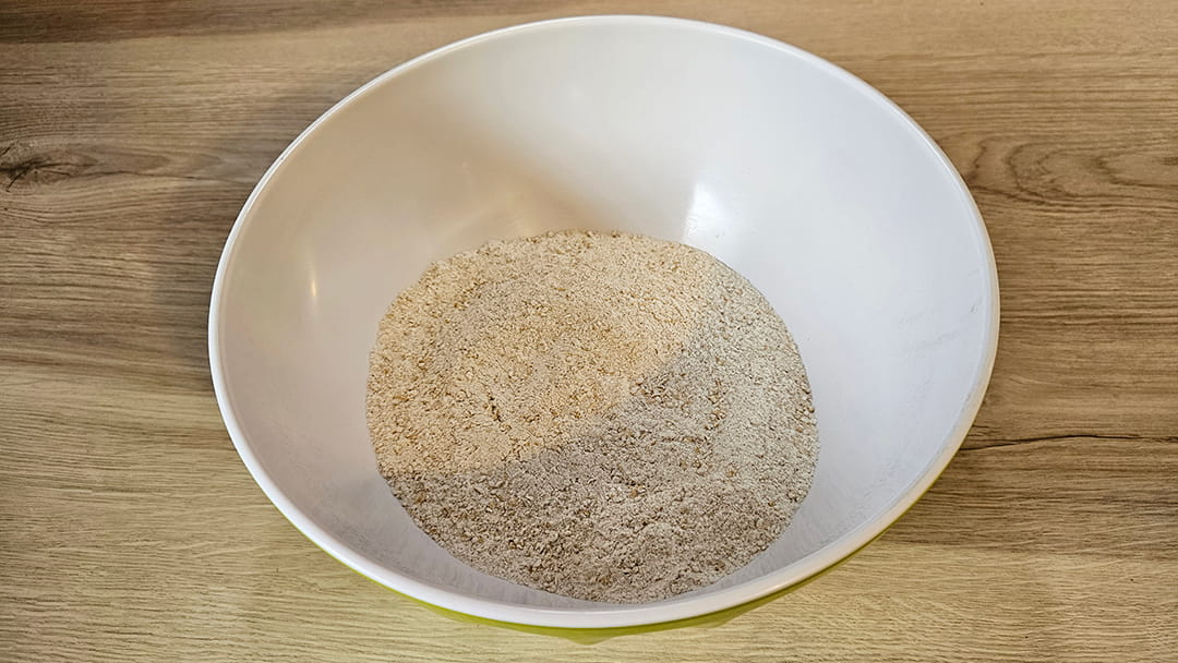 Sift the flour, bicarbonate of soda, and spices together in a bowl